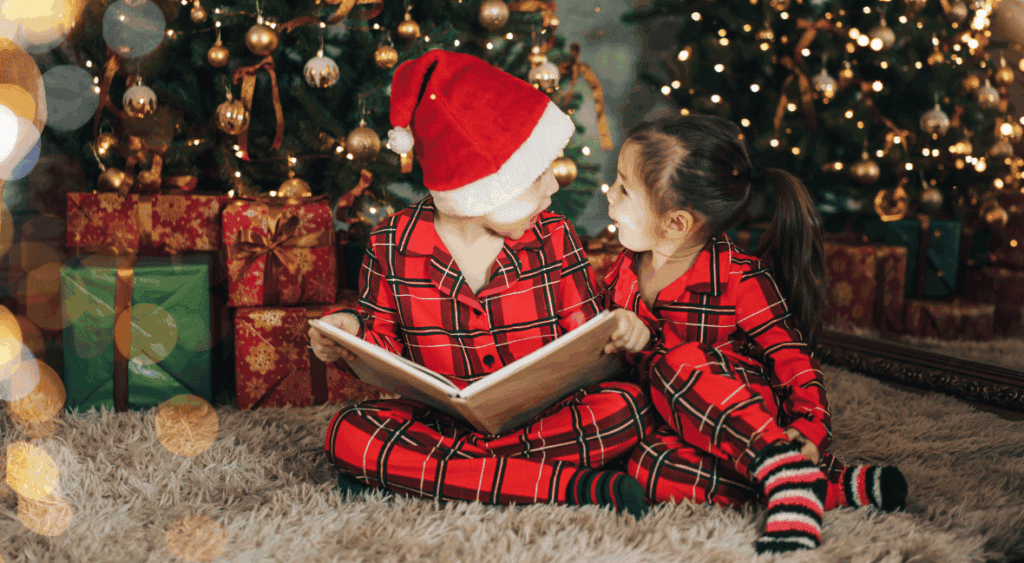 Kids reading a Christmas book