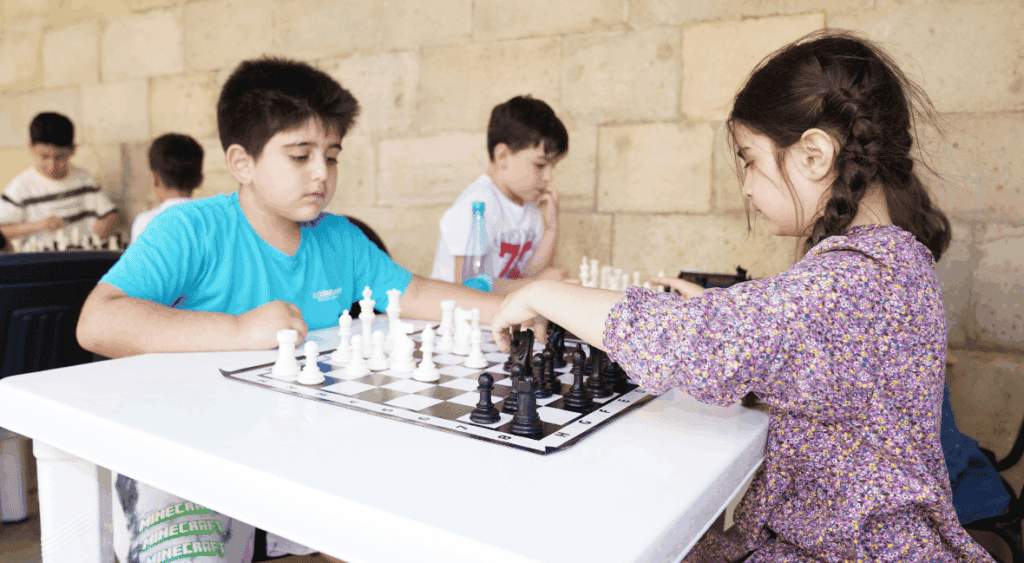 kids playing chess as a hobby