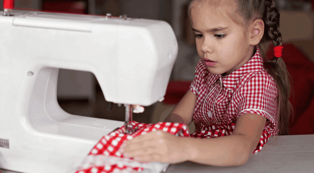 kid sewing
