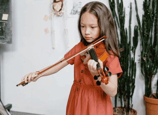 kid playing violin