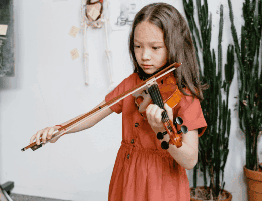 kid playing violin