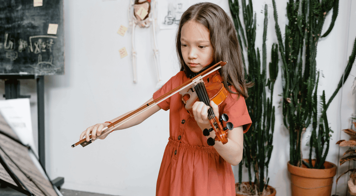 kid playing violin