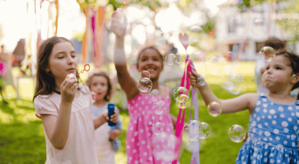 kids blowing bubbles